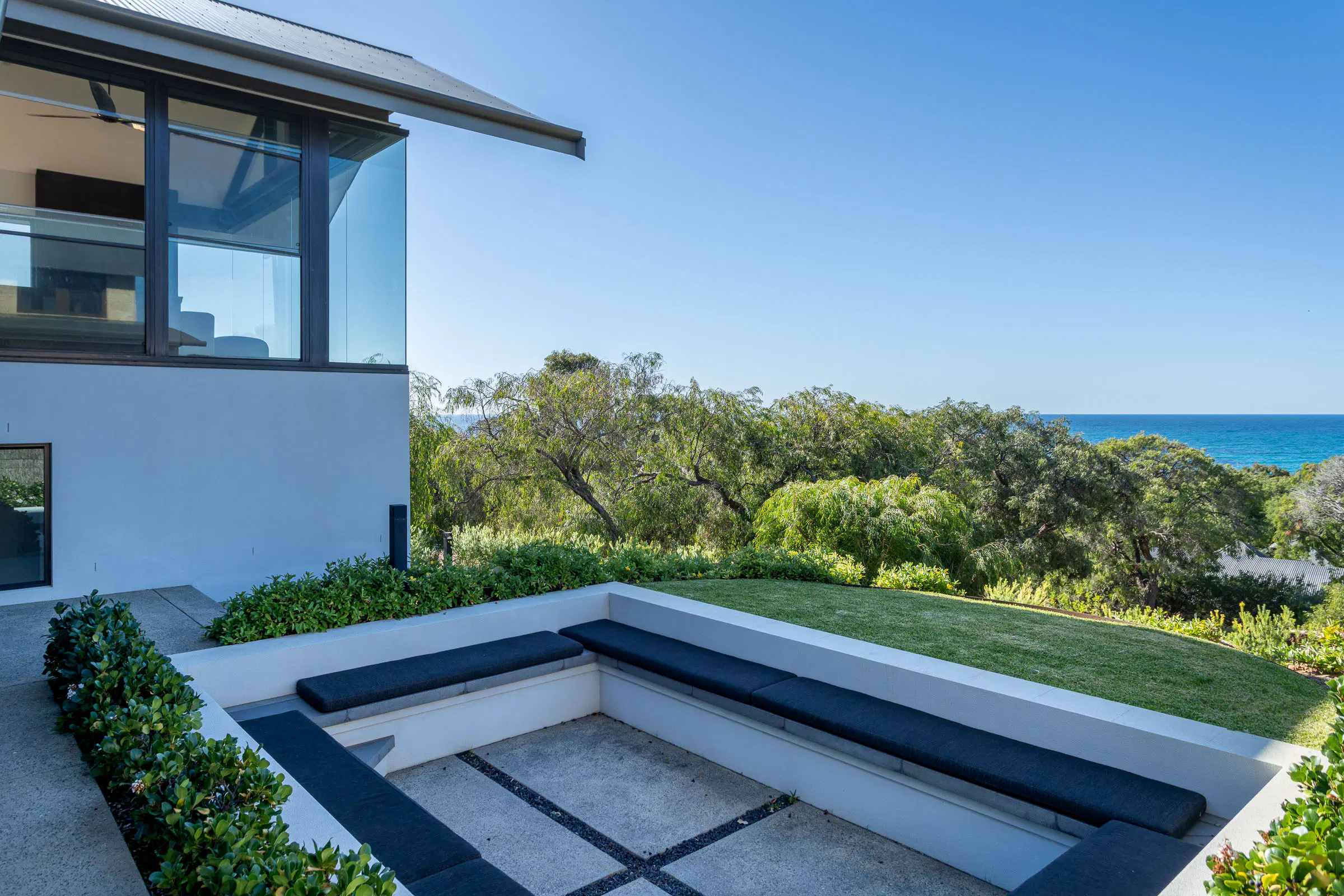 The pool terrace, looking over the scrub to the sea